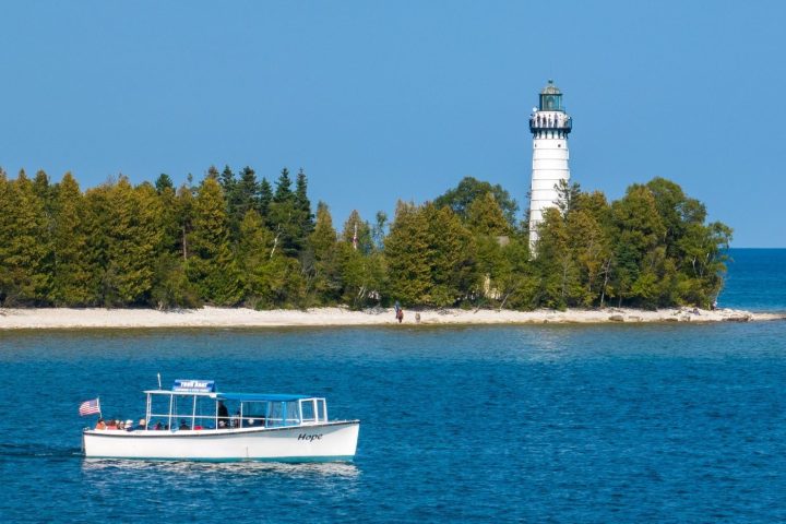 a small boat in a large body of water