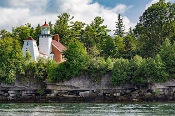 a stone bridge over a body of water