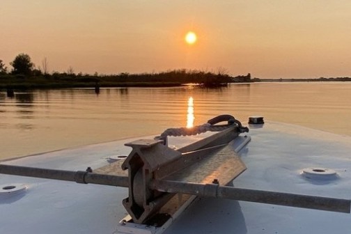 a boat parked next to a body of water