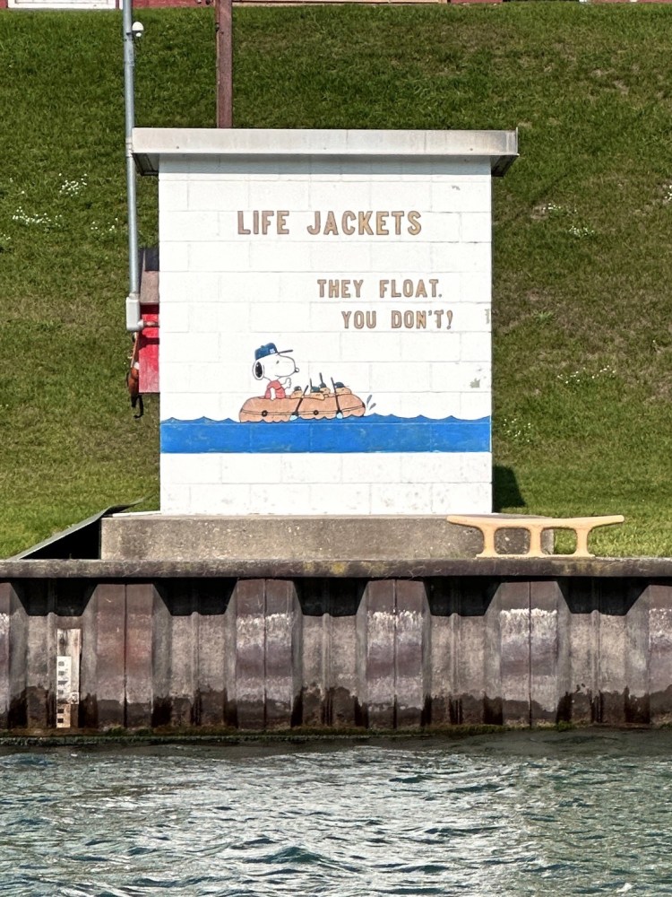 a sign in front of a building
