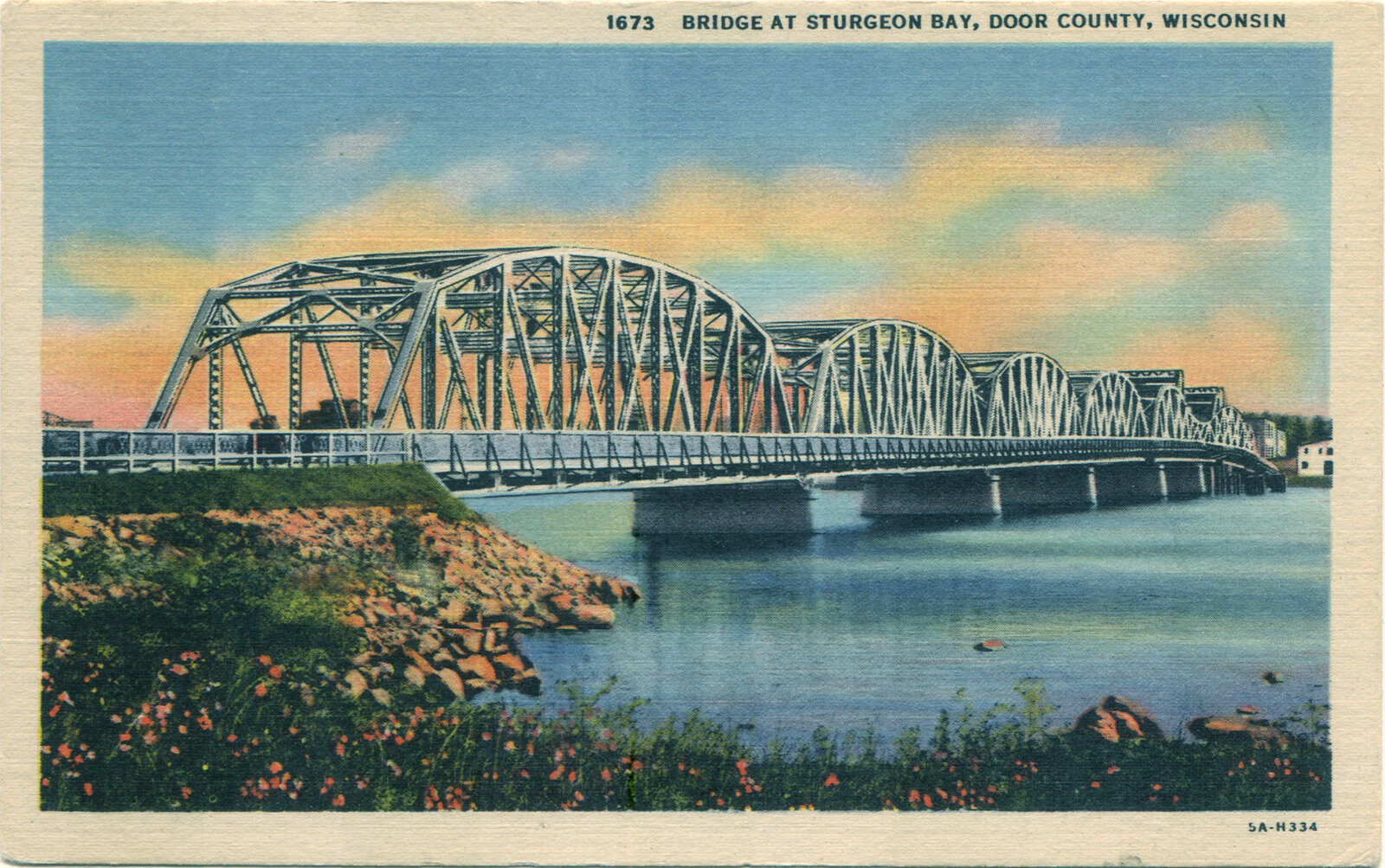 MichiganStBridge-postcard a bridge over a body of water