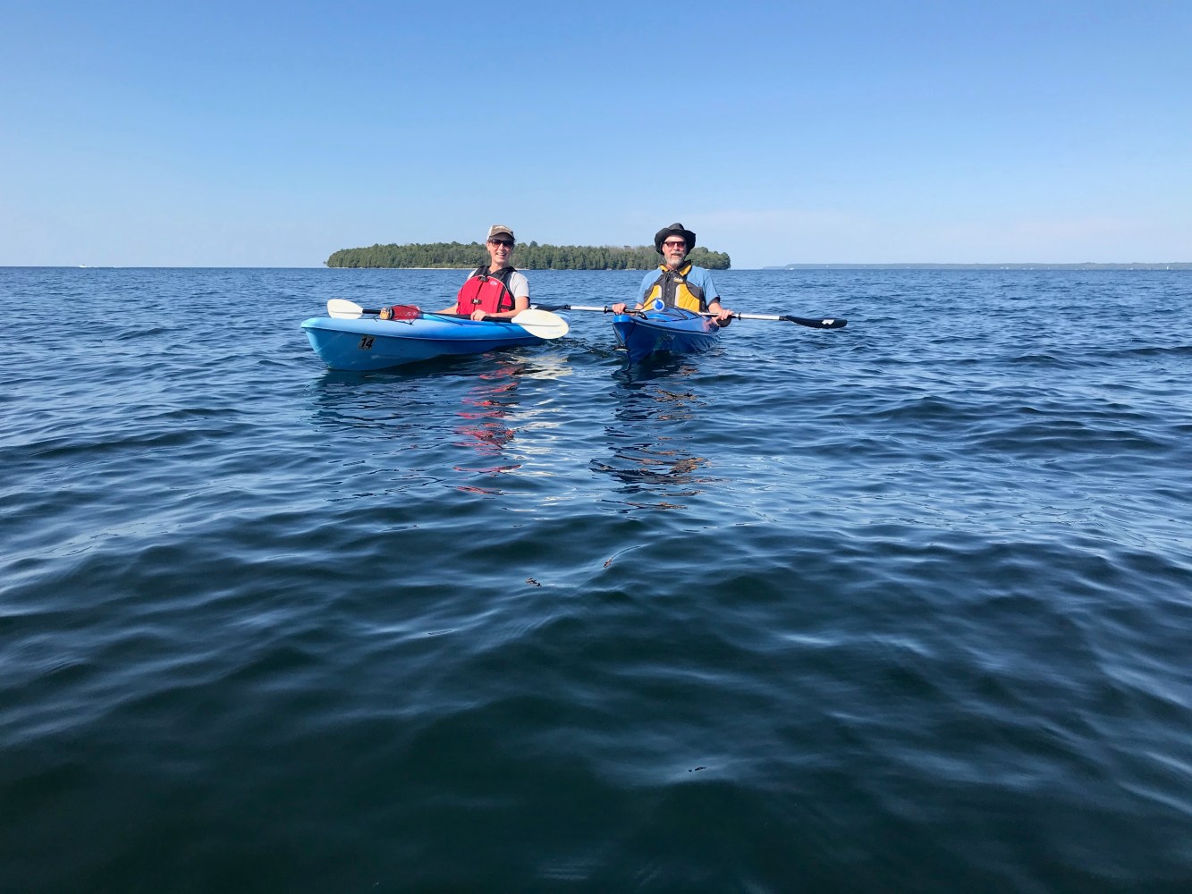 two kayakers in the water