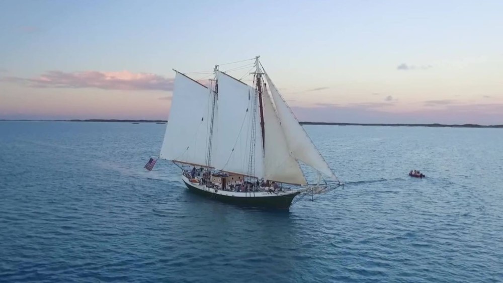 a small boat in a body of water
