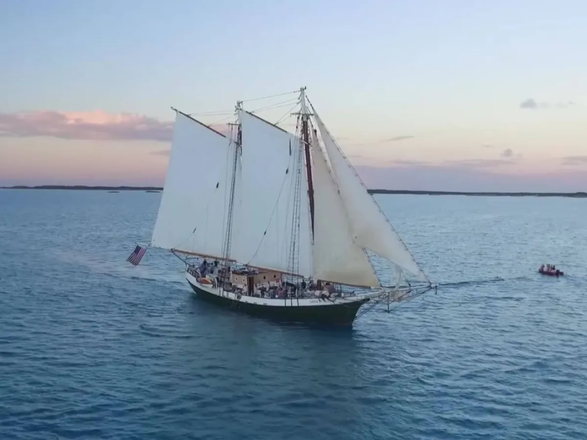 a small boat in a body of water